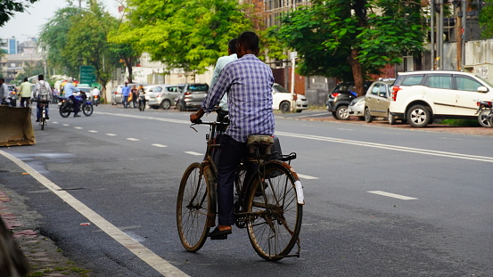 Sitamarhi, Bihar, India- 14 June 2022 :image of indian man going on bicycle.