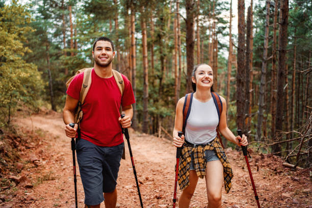 istock Happy couple hiking together 1413039017