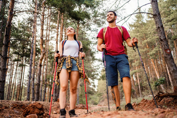 istock Happy couple hiking together 1413039203