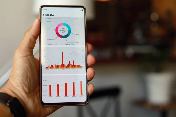 istock Man checking and analysing stock market data with mobile app on smartphone 1413041980