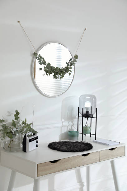 istock Stylish room decorated with beautiful eucalyptus garland 1413042260