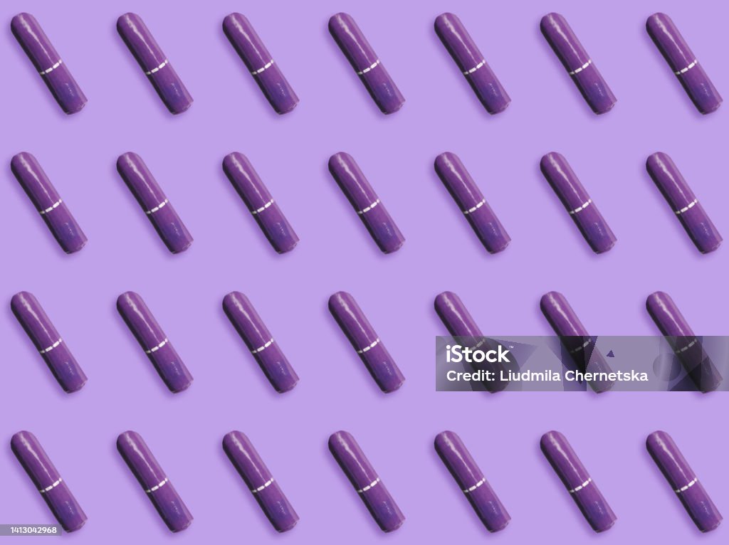Many tampons on violet background, flat lay Alternative Medicine Stock Photo