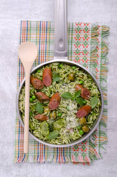 istock Pasta with vegetables and sausages 1413044775