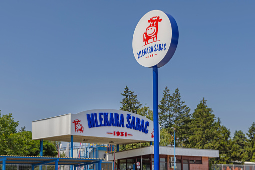 Sabac, Serbia - July 22, 2022: Sign Tower Mlekara Sabac Dairy Creamery Food Factory Production Since 1931 Traditional.