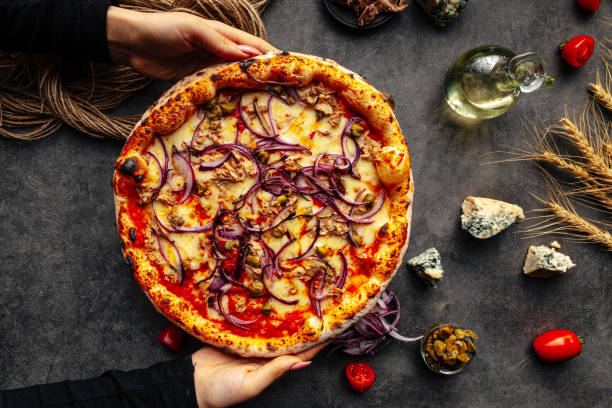 istock Baked onion pizza on the decorated background 1413050180