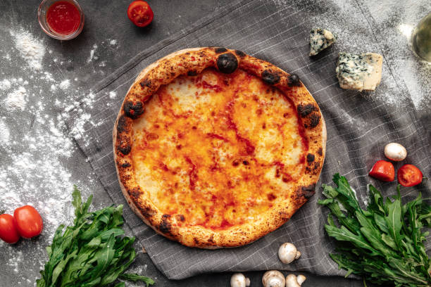 istock Top view on neopolitan fresh margherita pizza 1413050240
