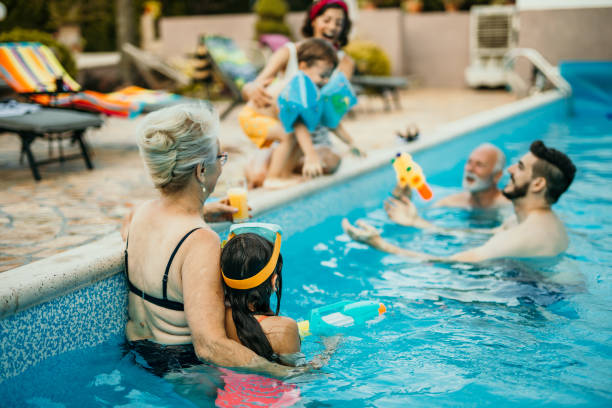 istock Family pool party 1413050300