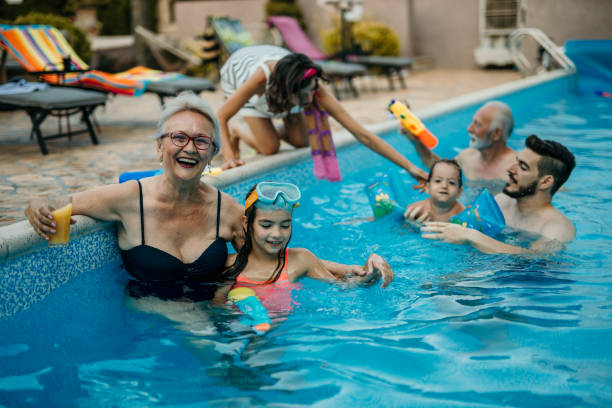 istock Family pool party 1413050303