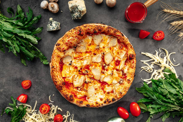 istock Baked chicken pizza on the decorated background 1413050504
