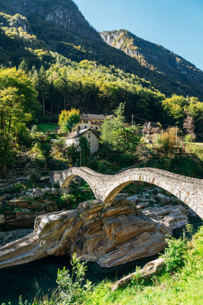 istock roman bridge over clear clean green water, Switzerland 1413051114