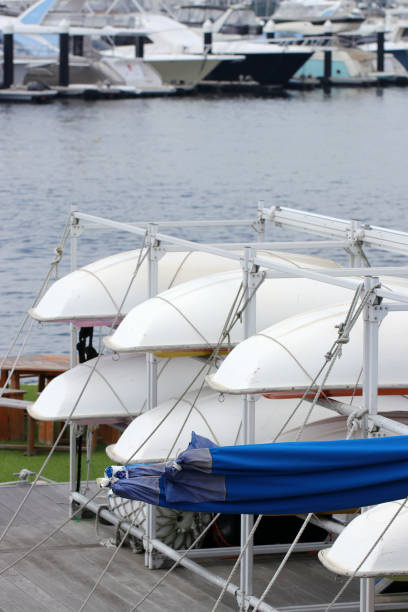 istock Small white yachts stored in the marina. 1413051158