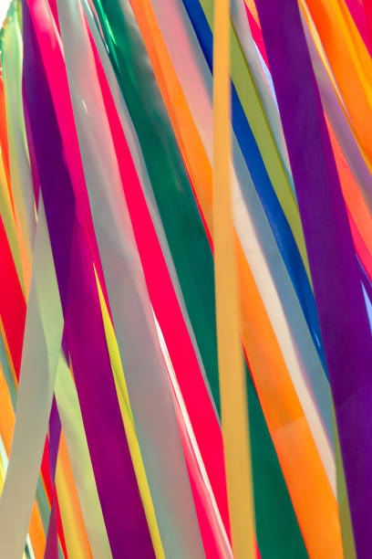 istock Multi colored ribbons in the nature abstract pastel colorful creative background 1413053629