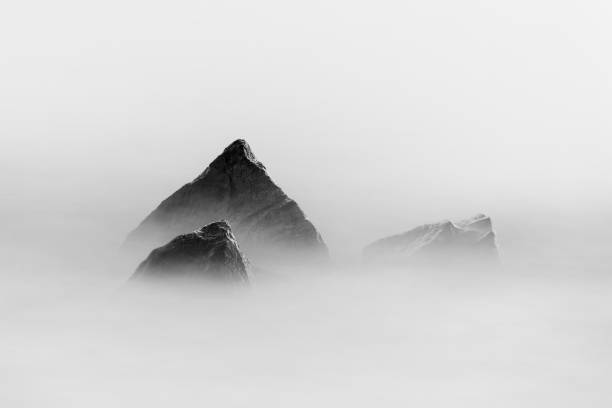 istock Rocks in sea long exposure ii mono 1413056041