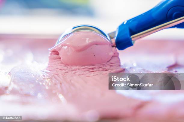 Strawberry Ice Cream With Scoop In Freezer Stock Photo - Download Image Now - Ice Cream, Scooping, Strawberry Ice Cream