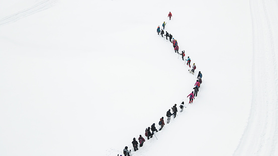 Aerial video of the trekking group walking in the snowy forest in Sakarya, Turkey in 2022.