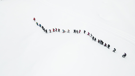Aerial video of the trekking group walking in the snowy forest in Sakarya, Turkey in 2022.