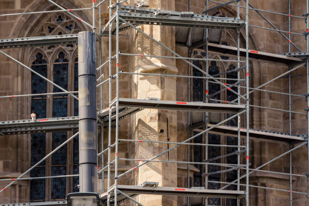 Old church restoration with scaffolding stock photo