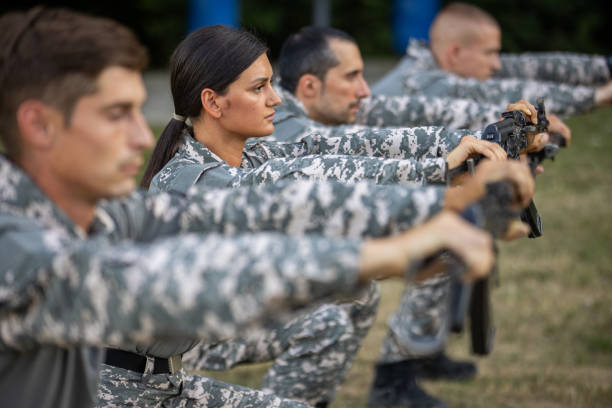 istock Military team, having an outdoor ground military training 1413062713