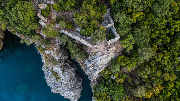 Aerial view of Olympos-Antalya, ancient city of olympos, olympos beach, people swimming on the beach, olympos castle, aerial view of the ancient city Aerial view of Olympos-Antalya, ancient city of olympos, olympos beach, people swimming on the beach, olympos castle, aerial view of the ancient city cirali stock pictures, royalty-free photos & images