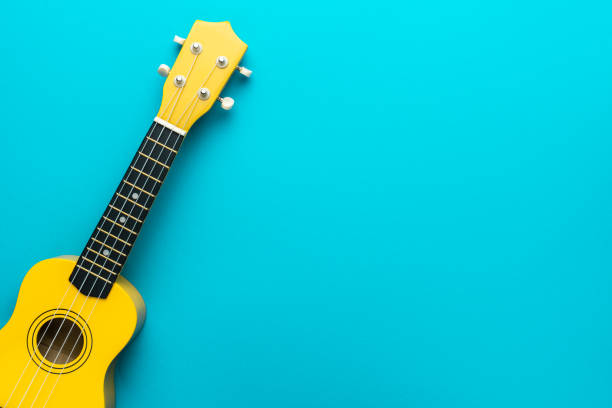 istock Top view of yellow ukulele with copy space 1413068202