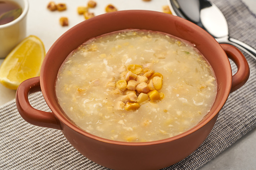 Sweet Chicken Corn Soup served in a dish isolated on grey background side view of fastfood
