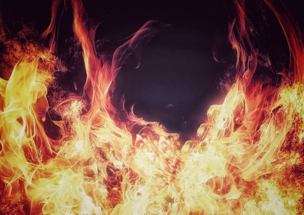 istock 3D illustration of flames burning in the dark 1413071958