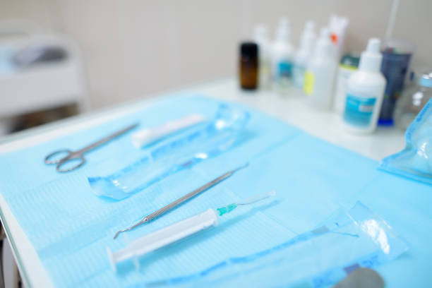 istock Table with sterile instruments in the operating room or doctor's office 1413073985