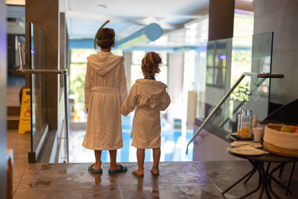 istock Brother and sister going on swimming in hotel 1413076106