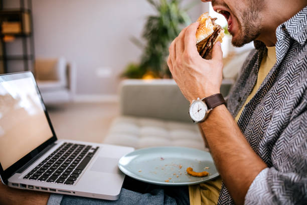 istock Work on the laptop and lunch 1413078765