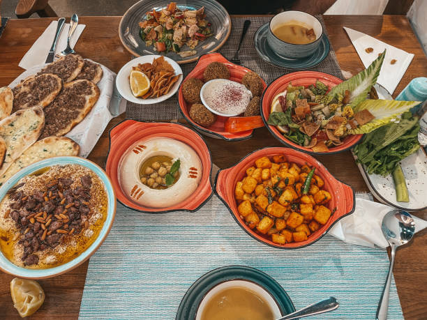 istock Fancy Lebanese Middle Eastern breakfast, Freshly baked Flatbread of cheese, appetizers - Arabian food manouche - Levantine cuisine 1413078834
