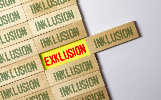istock Cubes, dice or blocks with the german words for inclusion and exclusion - inklusion exklusion on wooden background 1413083603