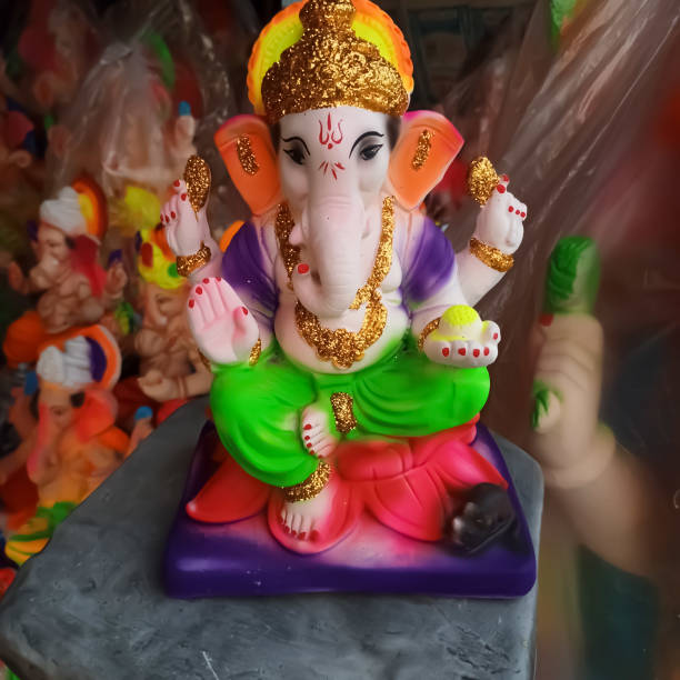 istock Beautiful Art work lord Ganesha statue prepare by mud 1413084959
