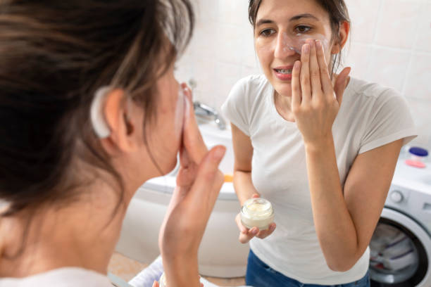 istock A young woman with cochlear implant  getting ready in the bathroom 1413088126
