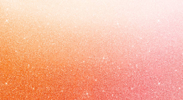 istock Warm pink peach orange color gradient premium luxury glitter shiny texture paper confetti dot background. 1413088164