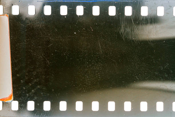 istock Dusty and grungy 35mm film texture or surface 1413088684