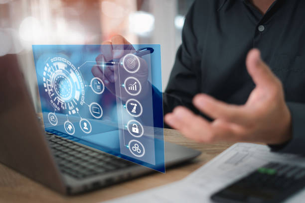 istock Business concept and engineering work on virtual screen,Close up hand a man holding pen mark on screen with engineering work plan and use laptop drawing document calculator on table 1413089484