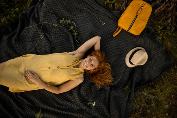 istock Woman relaxing in nature 1413092958