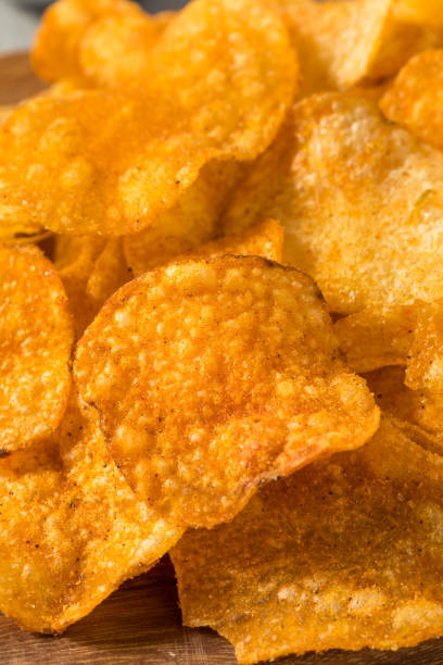 istock Crunchy Barbecue BBQ Potato Chips 1413096778