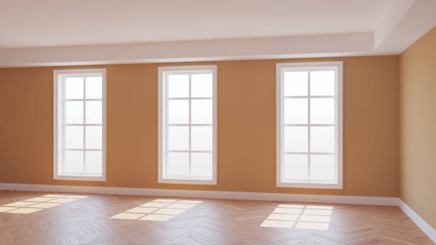 istock Sunny Interior with Beige Walls, Three Large Windows, Light Glossy Herringbone Parquet 1413098051