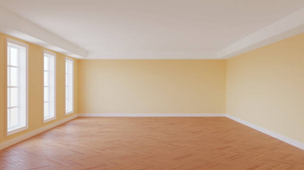 istock Beautiful Empty Room with Beige Walls, White Ceiling and Cornice, Three Large Windows 1413098058