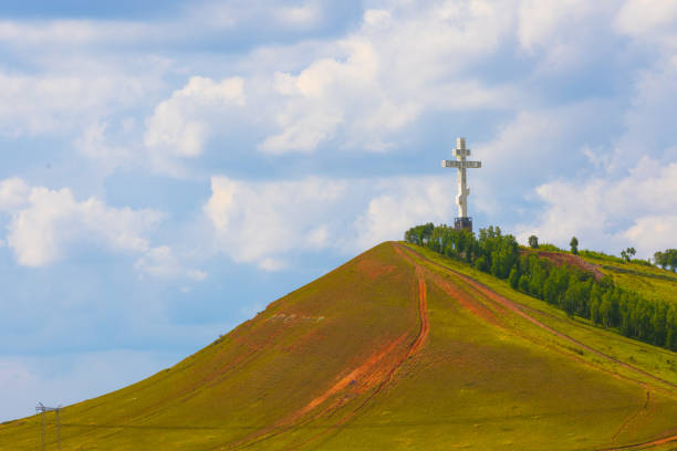 Summer landscape of Drokinskaya hill with Worshiping Orthodox cross near Krasnoyarsk, Russia