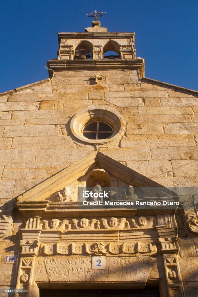 Chapel church Guadalupe Virgin, Rianxo, A Coruña, Galicia, Spain. Chapel church Guadalupe Virgin, Castelao town square, Rianxo, A Coruña, Galicia, Spain. Front low angle view, doorway sculptures. A Coruna Stock Photo