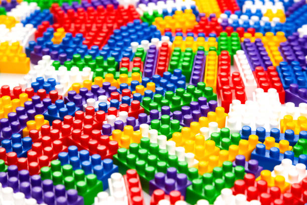 istock Abstract background texture of colored constructor blocks. Background of colorful plastic part of constructor. Pile of colored toy bricks. 1413105307