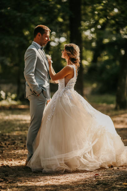 istock Bride and groom in nature on wedding day 1413107126