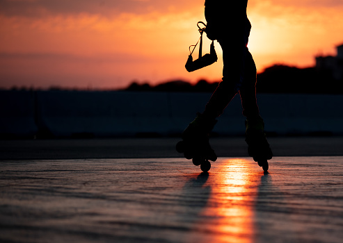 Rollerblade at sunset from coastline in Istanbul