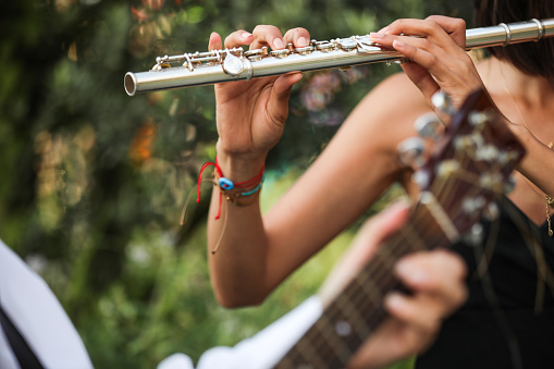 Young Woman Playing the Flute , Musician , Entertainment Culture