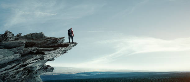 istock hiker mountaineer success view 1413115780