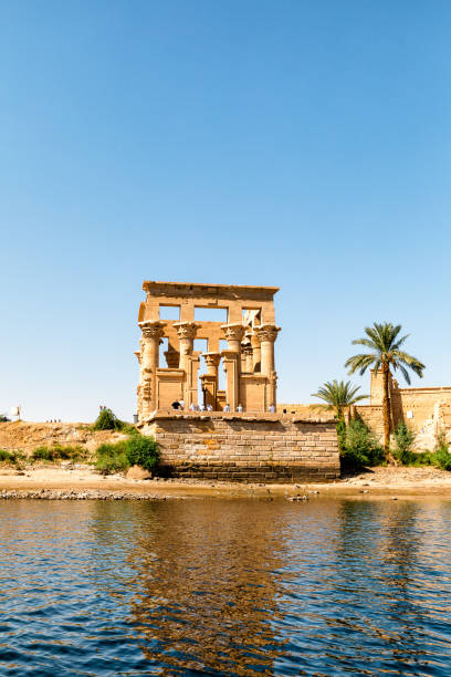Temple of Philae Temple of Philae in Aswan, Egypt is dedicated to the goddess Isis. It is located on an island and is accessible only by water taxi. temple of philae stock pictures, royalty-free photos & images