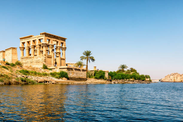 Temple of Philae Temple of Philae in Aswan, Egypt is dedicated to the goddess Isis. It is located on an island and is accessible only by water taxi. temple of philae stock pictures, royalty-free photos & images