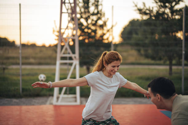 istock Couple playing basketball 1413117119